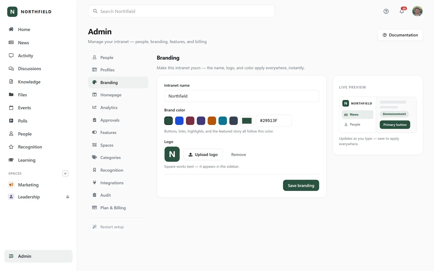 The Axero Go admin branding screen, where an administrator sets the site name, logo and brand color and sees the change previewed live.